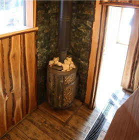 Чугунная банная печь Атмосфера L комбинированная сетка-ламель «Змеевик» наборный