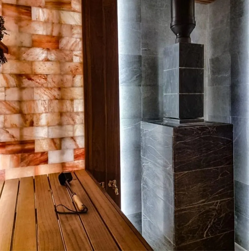 Чугунная банная печь Атмосфера XL в облицовке «Империя» Талькохлорит