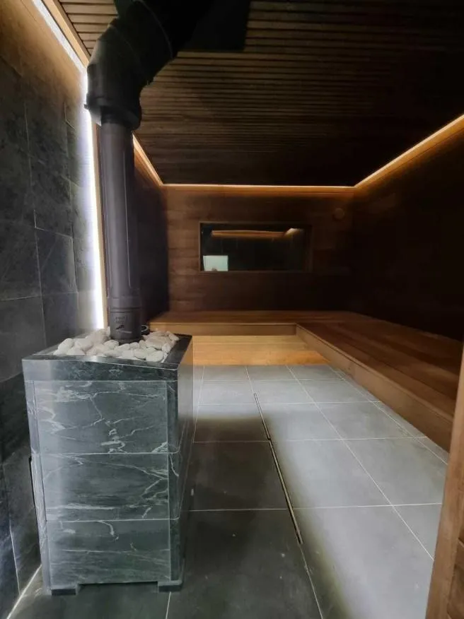 Чугунная банная печь Атмосфера L в облицовке «Талькохлорит»