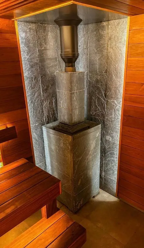 Чугунная банная печь Атмосфера XL в облицовке «Империя» Талькохлорит