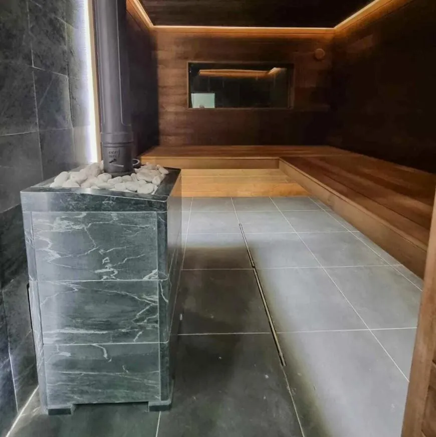 Чугунная банная печь Атмосфера L в облицовке «Талькохлорит»