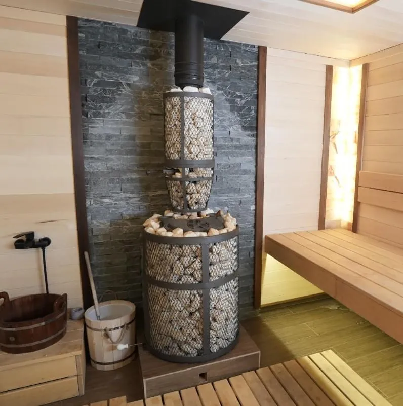 Чугунная банная печь AVANGARD ЗК 25 (М) Pro Ураган в сетке Тюльпан