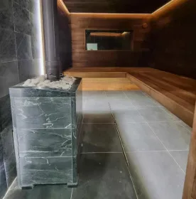 Чугунная банная печь Атмосфера XL в облицовке «Талькохлорит»