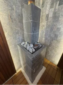 Чугунная банная печь Атмосфера L в облицовке «Талькохлорит»