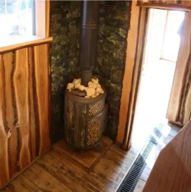 Чугунная банная печь Атмосфера L комбинированная сетка-ламель «Змеевик» наборный