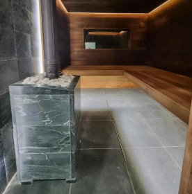 Чугунная банная печь Атмосфера XL в облицовке «Талькохлорит»