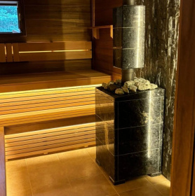 Чугунная банная печь Атмосфера XL в облицовке «Амфиболит»